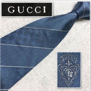 GUCCI グッチ　ネクタイ　レジメンタルストライプ　GG柄　総柄　シルク100% イタリア製　くすみブルー　ビジネス