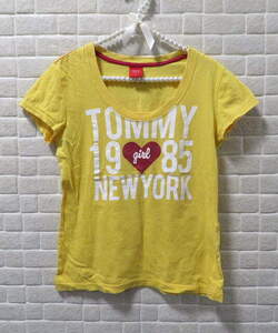 トミーガール tommygirl トミガ トミー トミーフィルフィガー Tシャツ 半袖トップス イエロー ロゴTシャツ 黄色 デザインTシャツ