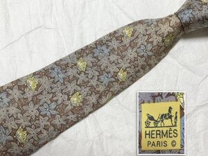 HERMES エルメス　ネクタイ　花と蝶　シルク100% フランス製　ベージュ　ブラウン