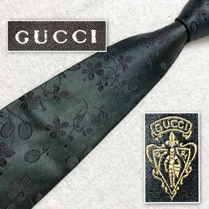 ■美品■GUCCI グッチ　ネクタイ　葉っぱ　ボタニカル　総柄　光沢感　シルク100% イタリア製　ダークグリーン　ビジネス