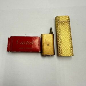 I223-J053241-0 ◎ Cartier カルティエ ガスライター オーバル型 ローラー式 ゴールドカラー 喫煙具 喫煙グッズ ①