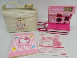 51●b872☆ジャンク品　トミー　ハローキティ　ティーンズ ポラロイドカメラセット　バッグ・説明書・アルバム　TOMY　現状