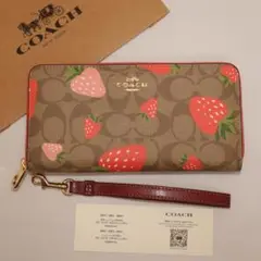 COACH　コーチ　長財布　シグネチャー柄にカラフルなイチゴのプリント