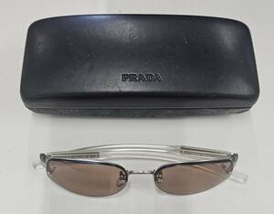 M-7785【同梱不可】980円～ 現状品　PRADA/プラダ　SPR52A　2AC-4C1　サングラス　ブラウン系レンズ　アイウェア　レディース　