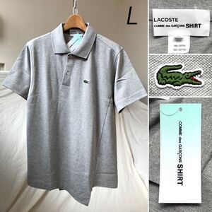 L 新品 2023AW コムデギャルソンシャツ LACOSTE ラコステ コラボ 鹿の子 斜行 アシメントリー ねじれ ポロシャツ グレー メンズ