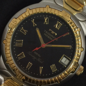 テクノス モサバ 177010.91 音叉式 腕時計 デイト メンズ 裏スケ 黒文字盤 純正ブレス 付属品あり 未稼働品 TECHNOS