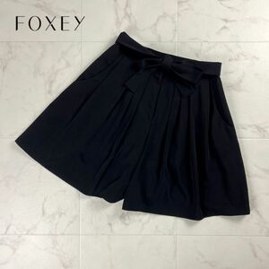 美品 FOXEY NEW YORK フォクシー ウエストリボン タックフレアショートパンツ キュロット ボトムス レディース 黒 サイズ40*OC91