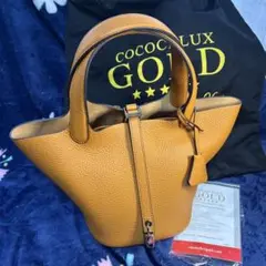 COCOCLUX GOLD オレンジ レザーハンドバッグ