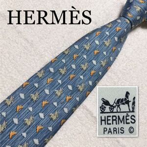 HERMES エルメス　ネクタイ　青空　ペガサスと鳥　雲　総柄　シルク100% フランス製　ブルー系　ビジネス