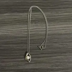 silver pearl eye necklace