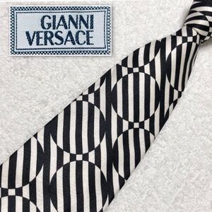 ■美品■GIANNI VERSACE ジャンニヴェルサーチ　ネクタイ　白黒ストライプ　右下がり　サークル　シルク100% イタリア製　ビジネス