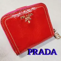 【良品】PRADA　プラダ　二つ折り財布　ラウンドジップ　　エナメル　赤