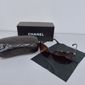 D276 中古 ケース付 CHANEL　シャネル　サングラス　リボンモチーフ 茶色