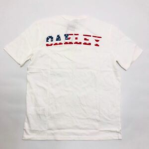 オークリー コットンTシャツ ホワイト OAKLEY B1B FLAG SS 100 WHITE 457329 100サイズS