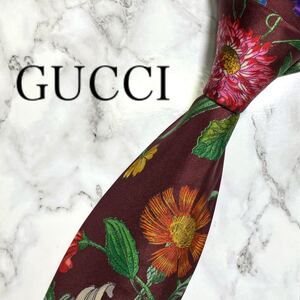 GUCCI グッチ　ネクタイ　ボルドー　赤　花柄　フラワー　ボタニカル　スーツ　ブランド　イタリア　シルク　