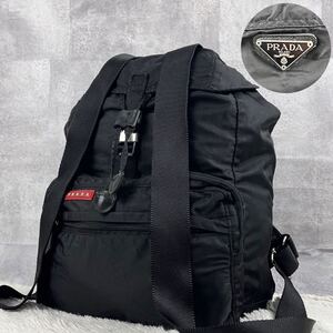 美品 PRADA SPORTS プラダ スポーツ バックパック リュック メンズ ナイロン レザー フラップ 3角プレート ロゴ型押し ステッチ 金具 巾着