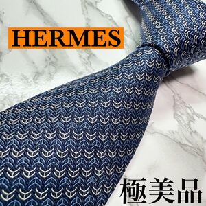 極美品 現行モデル HERMES ネクタイ シルク100% ロッキングH H柄 馬車 レギュラータイ 刺繍 ネイビー 送料無料