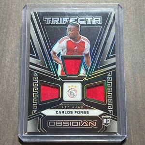 Carlos Forbs RC - AFC Ajax Trifecta Material /199 Memorabilia 2023-24 Panini Obsidian Soccer