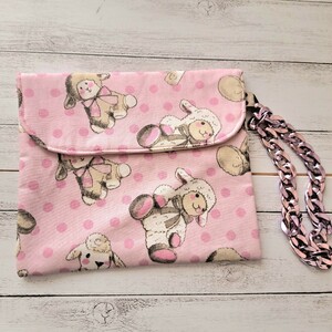 237 羊柄のオムツ入れ　ピンク　ハンドメイド　13×21センチ