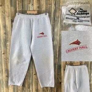 アメリカ輸入古着 90s USA製　The Cotton exchange CALVERT HALL カレッジロゴ ホワイトグレー系 シミあり