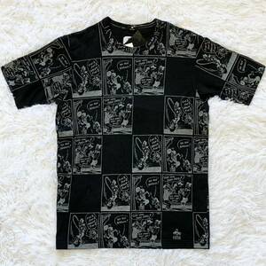 新品 eye JUNYA WATANABE MAN × PUMA ジュンヤワタナベ コムデギャルソン プーマ Tシャツ Mサイズ 黒×50sプリント柄 日本製