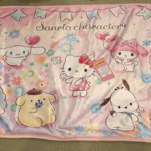 サンリオ★ボアひざ掛け　ブランケット　70×100cm　ピンク　シナモロール　ハローキティ　マイメロディ　ポチャッコ　ポムポムプリン