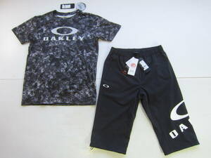 新品◆オークリー OAKLEY 半袖 Tシャツ & ７分丈 ショート パンツ M 黒 迷彩 UVカット 抗菌防臭 吸汗速乾 4WAYストレッチ トレーニング /L