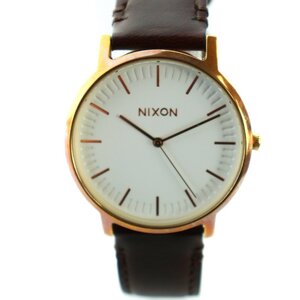 ニクソン NIXON BRINGIT ポーターレザー Porter Leather 腕時計 ウォッチ クォーツ 白文字盤 ロゴ レザーベルト ゴールド色 茶