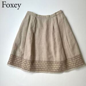 良品 FOXEY BOUTIQUE フォクシーブティック フレアスカート リネンスカート 麻 ロマネスク 膝丈 シルク ロゴプレート 40 レディース