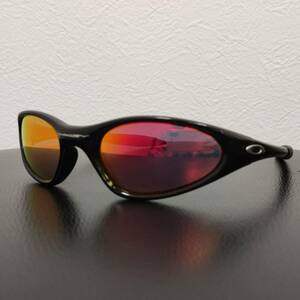 OAKLEY サングラス MINUTE サングラス ブラックフレーム×赤系レンズ 中古品 ミニッツ 