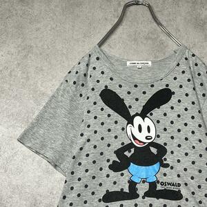 ▲【入手困難】COMME des GARCONS×OSWALD プリントTシャツ