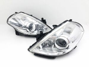 管r240415-0104 JC11 ティーダ HID ヘッドライト 左右 STANLEY P7780 ランプ レンズ 運転席 助手席 側 外装 TIIDA NOTE ノート C11 E11