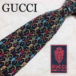 ■表面美品■希少デザイン■GUCCI グッチ　ネクタイ　馬に跨る騎手　総柄　モチーフ　シルク100% イタリア製　ブラック×マルチカラー