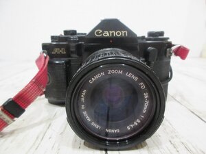 １円　yo 　Canon キャノン 一眼レフフィルムカメラ AE-1/レンズ CANON ZOOM LENS FD 35-70mm 1:3.5-4.5 ブラック系 【星見】