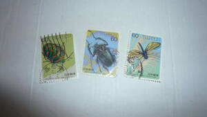 昆虫3種（キバネツボトンボ・ヤンバルテナガコガネ・アカスジキンカメムシ）使用済み切手