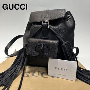 h69【美品】グッチ GUCCI　バンブー　タッセル　フリンジ　ターンロック　ブラック　黒　レザー　革　巾着　リュック　バックパック 337149