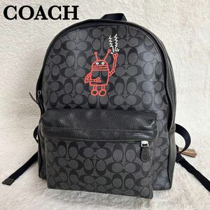 【超希少品】COACH　コーチ×Keith Haring　リュック　レザー　PVC　シグネチャー　ロゴ総柄　ブラック　F11701　コラボ品　チャーム付き