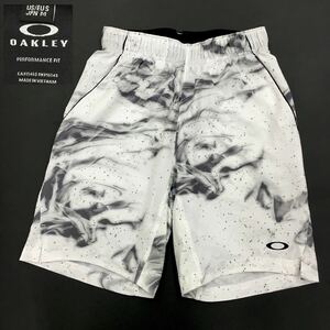 OAKLEY オークリー ゴルフウェア スポーツ ショートパンツ グラフィック総柄 ロゴプリント メンズ サイズM ホワイト 白