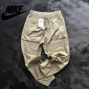 格安送料 XLサイズ 新品 NIKE ナイキ スポーツウェア カフパンツ トラックパンツ コットン ウーブン パンツ ナイロン ジョガー aDD5311-247