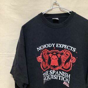 341.スペイン異端審問プリントTシャツ古着アメカジアメリカUSA買付け送料無料サイズXL宗教ブラックビンテージフルーツオブザルーム