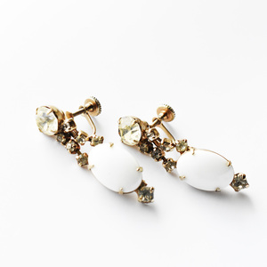 Vintage plasticrhinestone white earrings