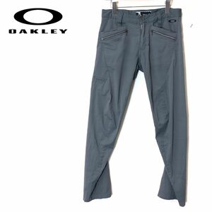 1K2991-F◆ oakley オークリー スカル パンツ ボトムス ◆ size32 ポリエステル100 グレー 古着 メンズ ゴルフウェア