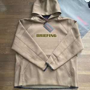 送料無料BRIEFING GOLFブリーフィング最新MENS秋冬BIGBGロゴHOODIE多層ダンボール構造防寒保温伸縮性BGパイピング星条旗Oliv(大特価XL)新品