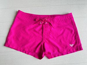 ROXY(ロキシー) ピンク系スイムショートパンツM美中古　ショッキングピンク/水着