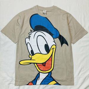 新品未使用ディズニー Tシャツ Mサイズ 大きなドナルドダック柄 クルーネックTee 送料無料 1点のみ レディースメンズ 半袖Disneyセール激安