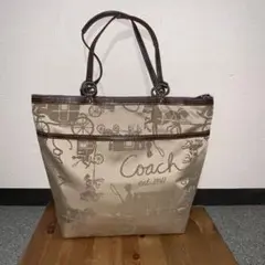 コーチcoachトートバッグベージュ総柄GOLDピンク　ホース