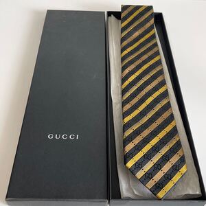 グッチ（GUCCI）黒ゴールドストライプインターロッキングGG柄ネクタイ