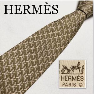 HERMES エルメス　ネクタイ　トビウオ　総柄　シルク100% フランス製　カーキ×ベージュ　ビジネス