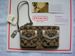 ●アメリカ直輸入★新品★人気の世界ブランド・COACH★ おしゃれで可愛いシグネチャーミニバッグターンロックポーチ★8616 SKHGD