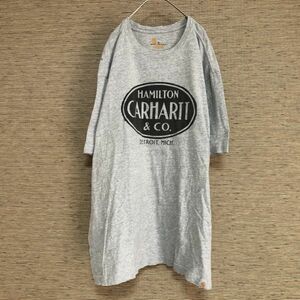 カーハート　半袖Tシャツ　デカロゴ　ビッグロゴ　グレー　エンブレムタグ27 古着　人気　希少デザイン　carhartt ビッグプリント ゆるだぼ